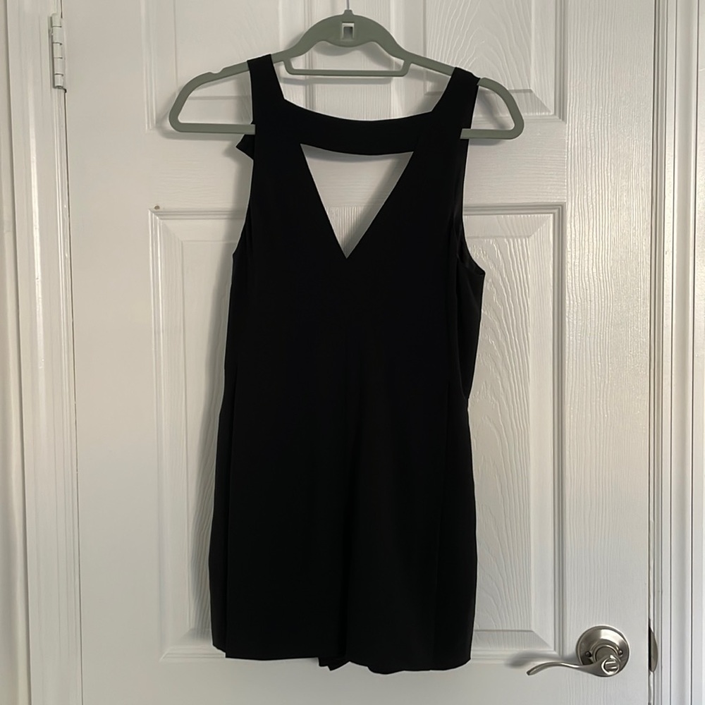 CMEO Collective Black romper w/ high neckline & triangle cutout front and back.
